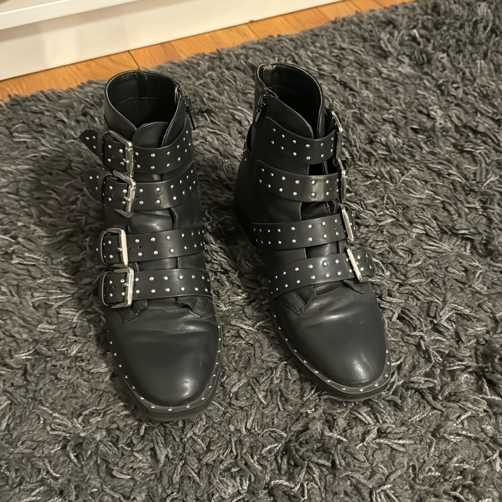 Buckled black boots